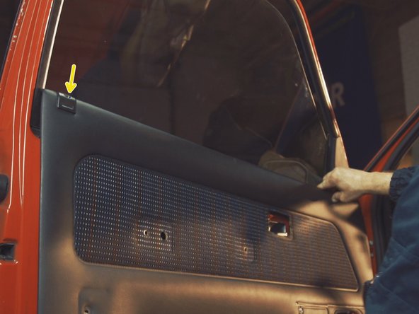 
Pass the latch through the dedicated hole by lowering the panel
