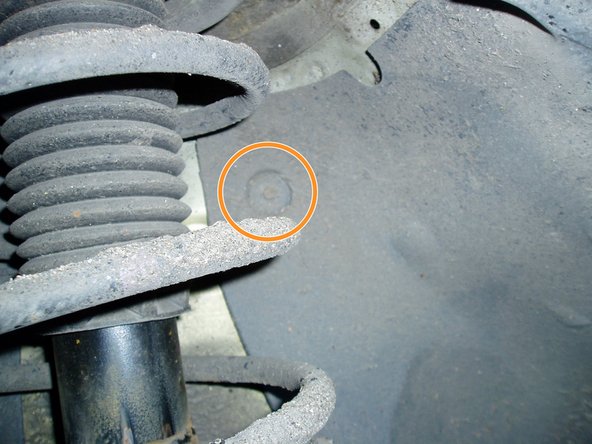 Retirer le pare boue.