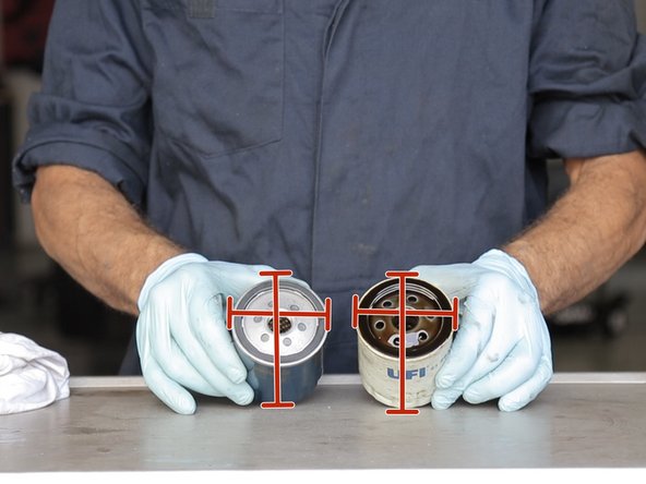 Appliquer de l'huile sur le joint du nouveau filtre à huile