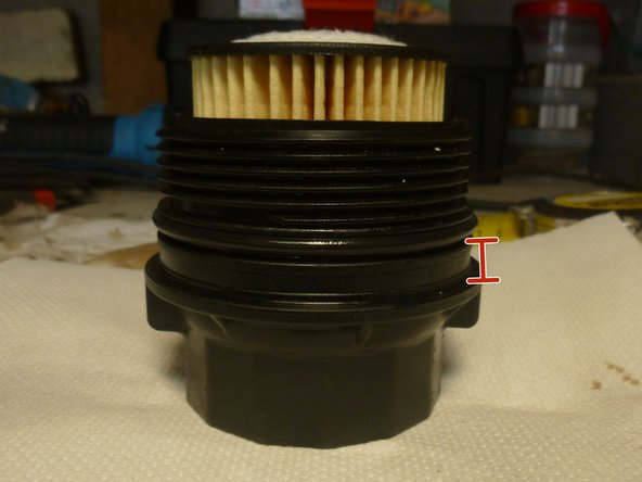 Le joint du porte filtre est à 10 mm de l épaulement , il doit être placé dans la gorge prévue a cet effet, ne pas oublier de huiler le joint.