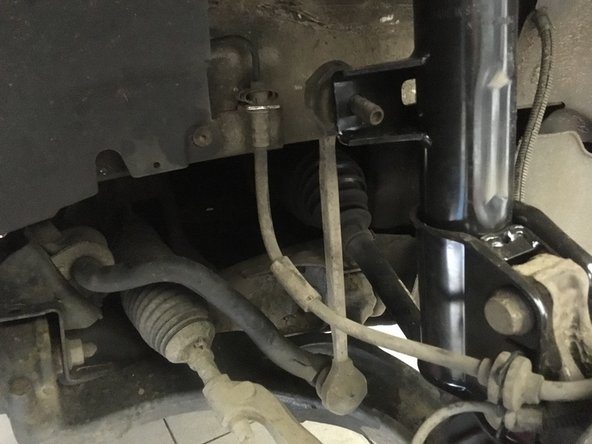 Serrer l'écrou de 18