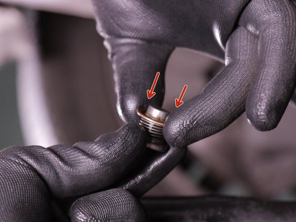 Placer le nouveau joint de vidange sur le bouchon du carter