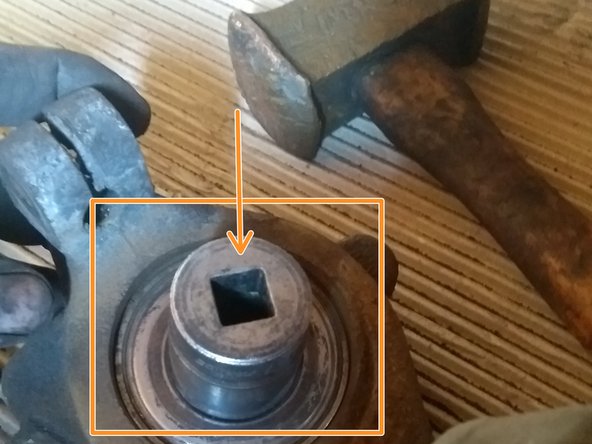 
Install the hub firmly in a vise. Using a socket of the correct size, tap the bearing.
