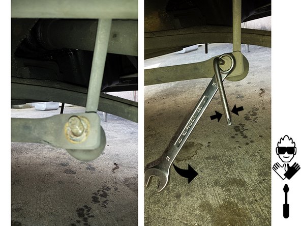 Avec la clé à oeil dévisser l'écrou de fixation supérieur tout en maintenant l'axe de la biellette avec la clé Torx (ou Allen selon le montage)