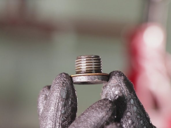 
Insert the drain gasket onto the sump plug
