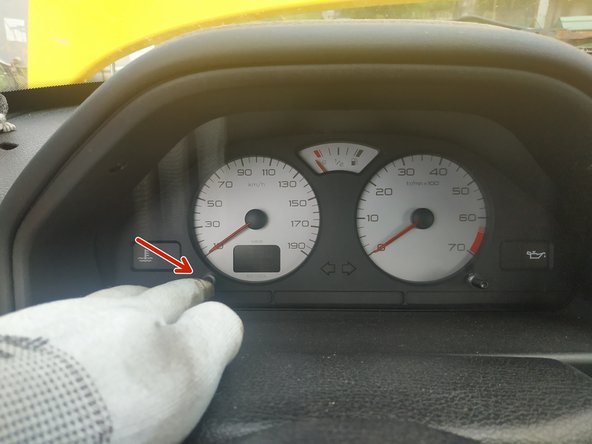 
press (and hold) the trip meter button
