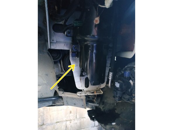 mettre en place la tôle de fixation