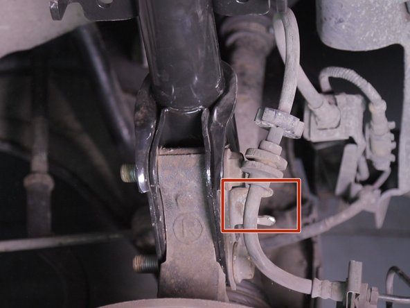 Replacer le flexible de frein dans son emplacement