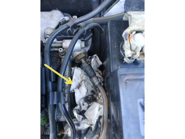 placer un chiffon sous la durite et débrancher