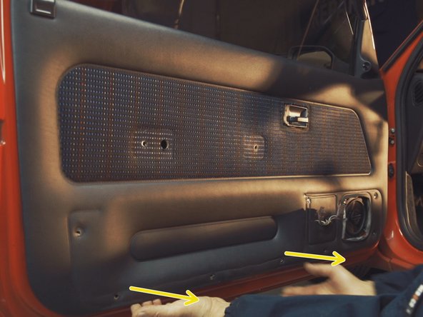 
Pull the bottom of the door panel to unclip it from the door
