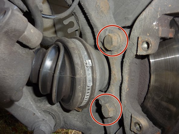 Repérer les 2 vis de fixation du support.