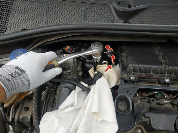 débloquer la tête à l'aide d'une clé de 24mm