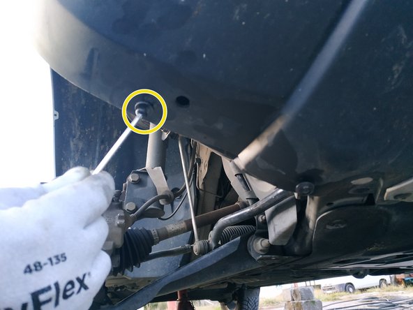 puis visser les 2 vis du bas à l'aide de la clé torx T20