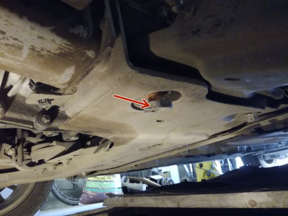 au dessus de l'écrou 30 avec clef de21 continuer de dévisser puis sortir le boulon