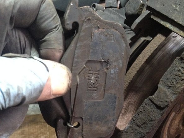 
Tilt the pad out of the caliper
