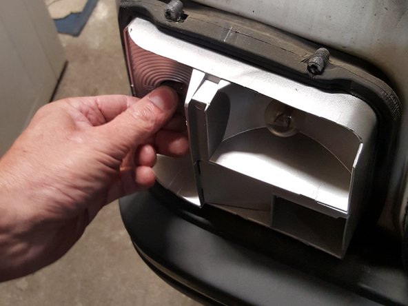 
Press the bulb and screw it in a quarter turn at the same time.
