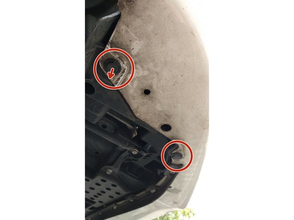 
The clips holding the bumper to the black plastic front wheel arch protectors need to be removed.
