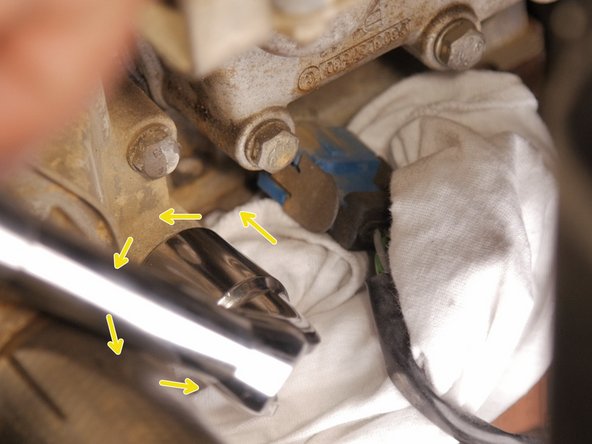 
With a 19 pipe wrench, loosen the temperature probe
