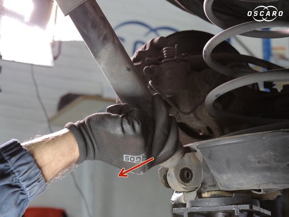 Retirer la vis et sortir l'amortisseur