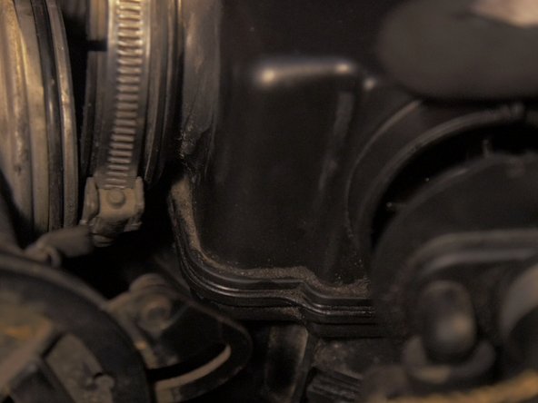 
Replace the air box cover on the filter
