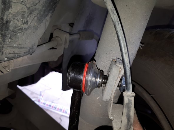 Reposer le support du câble et l'écrou