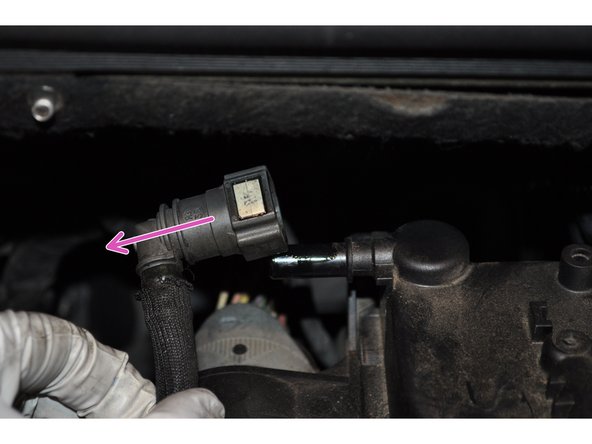 
Unscrew the vacuum air line clamp attached to the top of the filter
