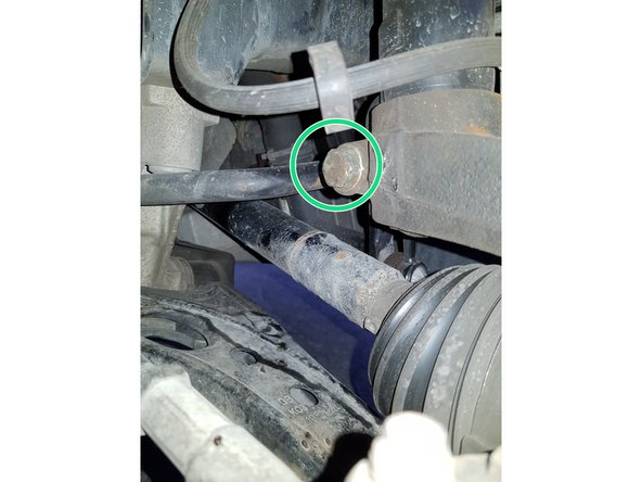 Avec une douille de 10mm retirez la vis.