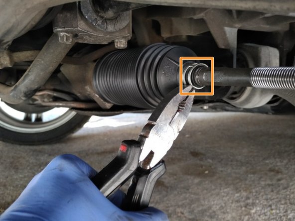 
Using pliers, put the outer retaining collar in place
