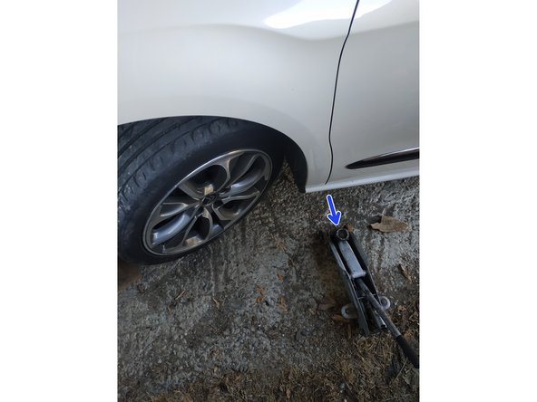 lever la voiture et retirer la chandelle