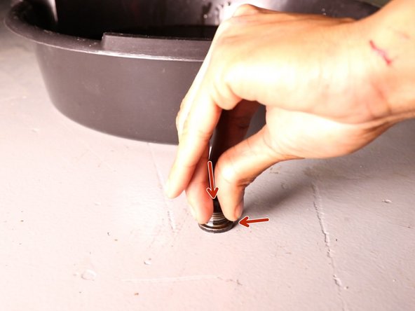 Positionner le nouveau de vidange sur le bouchon du carter