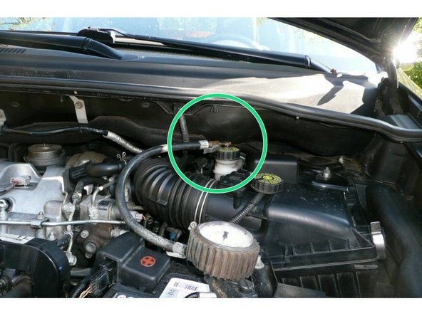 Placer le bouchon de mise en pression et raccorder la poignée de gonflage