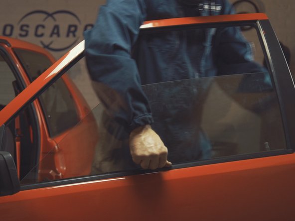 
Replace the exterior strip starting with the rearview mirror side
