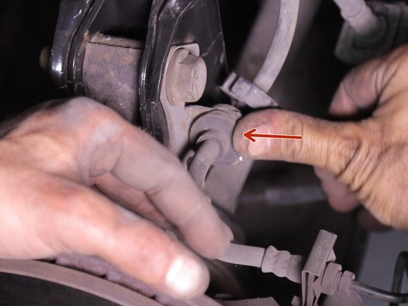 Replacer le flexible de frein dans son emplacement