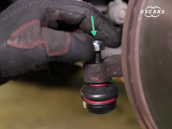 Placer l'écrou sur la rotule