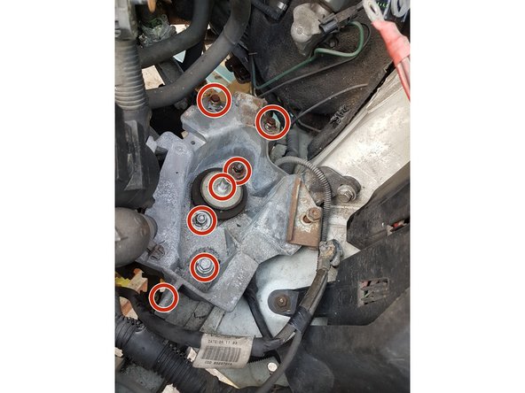 Dévisser les vis du support de boite.