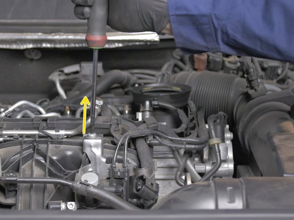 Retirer la vis sur le dessus support à l'aide d'un tournevis Torx T15