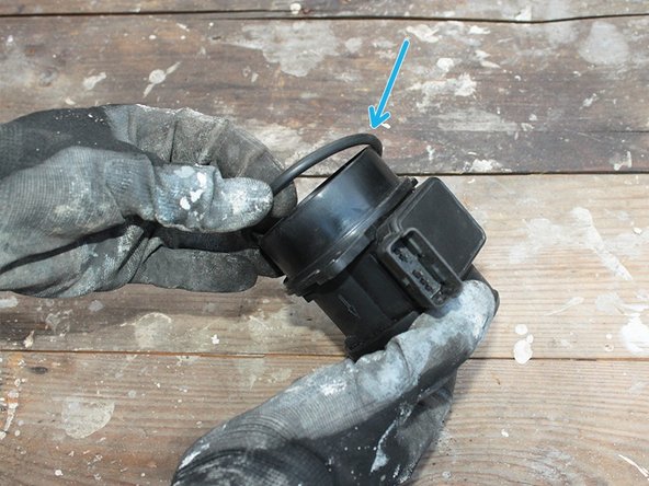 Replacer le joint sur le nouveau débitmètre.