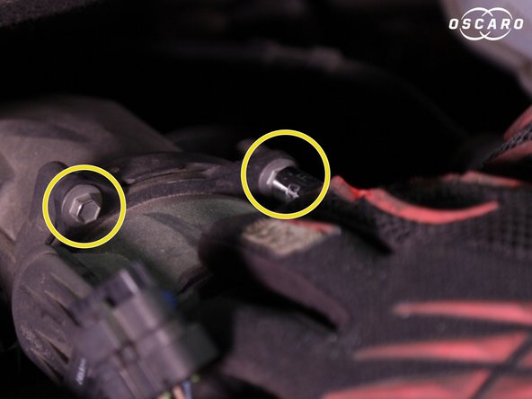 Deviser les deux vis du débitmètre