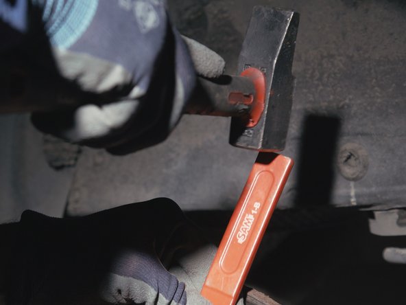 Retirer le cache d'axe