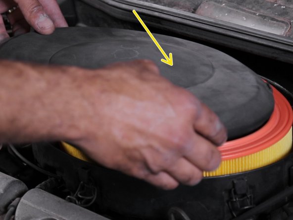 Replacer le couvercle de la boite à air