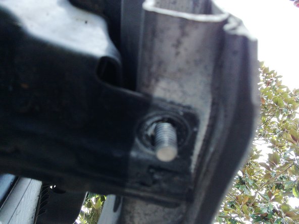 
Using the E12 Torx key and the 13mm wrench, tighten the two bolts
