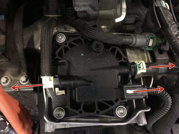 
Disconnect the hoses and the sensor
