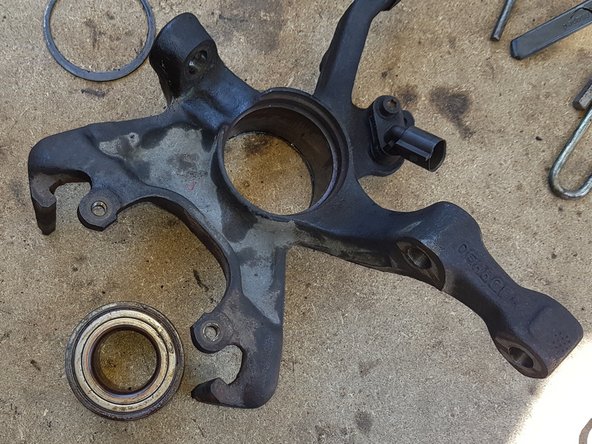 Avec des cales plus grosses retirez le roulement.