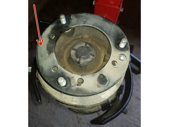 Retirez le joint rondelle en métal.