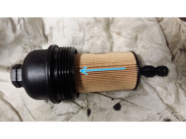 Remonter le filtre neuf en le glissant sur la tige