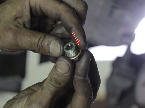 Replacer le nouveau joint sur bouchon