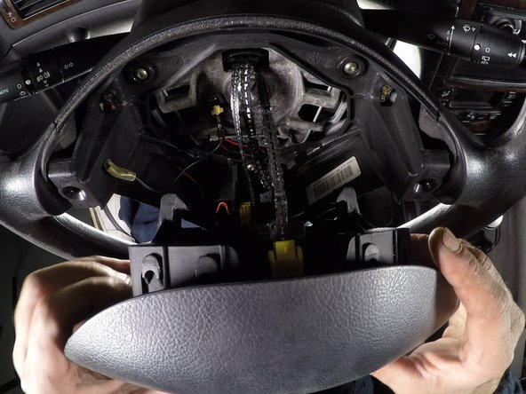 Refermer la languette de verrouillage