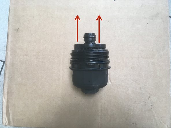 Tirer vers le haut pour retirer la cartouche de la cloche