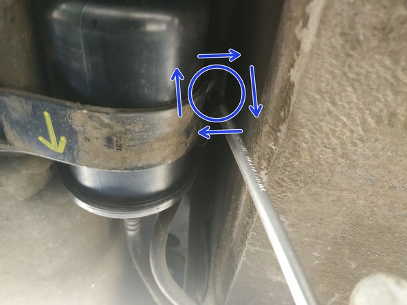 et visser la vis de maintien à l'aide du tournevis cruciforme