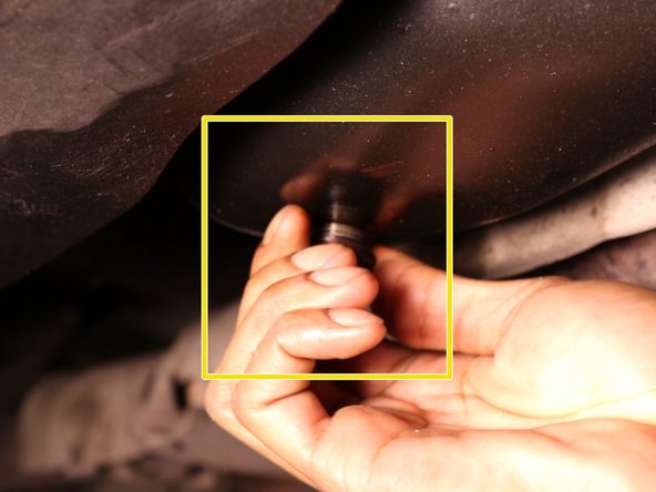 Replacer le bouchon du carter et revisser le à la main